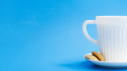 Cup of milk with cookies