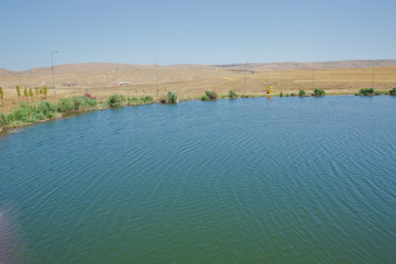Landscape of an mountain lake in front of mountain range. Glorious lake landscape. The...