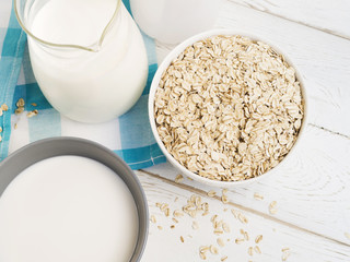 Oatmeal bowl and jar of milk
