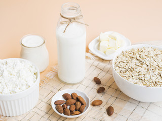 Obraz na płótnie Canvas Breakfast with oatmeal, milk and almonds