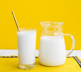 Jar and glass of milk