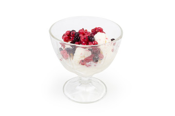 Ice cream with berries in the glass for ice cream