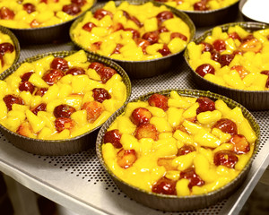 fruit cake with strawberries and pineapple in syrup. Fresh summer dessert, background
