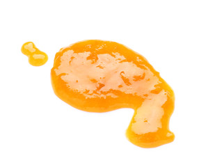 Tasty apricot jam on white background