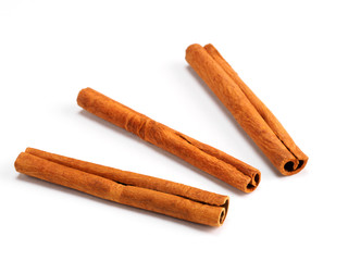 Cinnamon (Cinnamomum verum) spice on white background