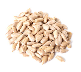 Peeled sunflower seeds on white background
