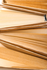 Many different books, closeup view