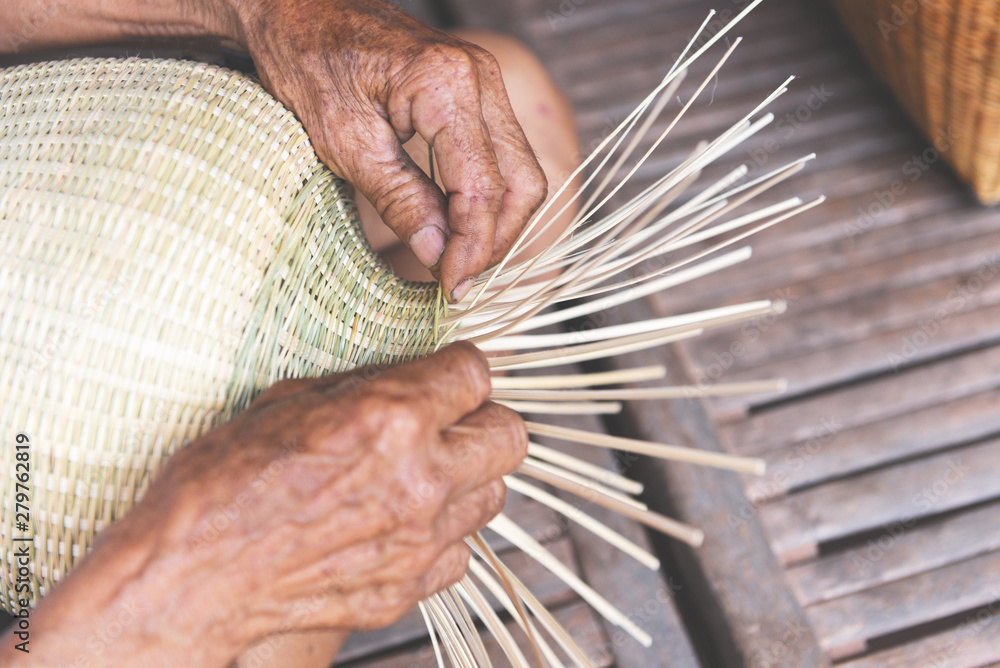 Wall mural weaving bamboo basket wooden - old senior man hand working crafts hand made basket for nature produc