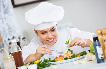 Professional chef decorating baked rainbow