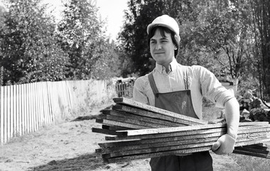 man in worker's clothes black and white