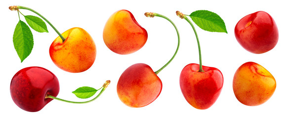Yellow cherries with stems and leaves isolated on white background