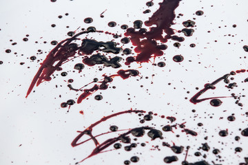 Splattered blood stain on white background