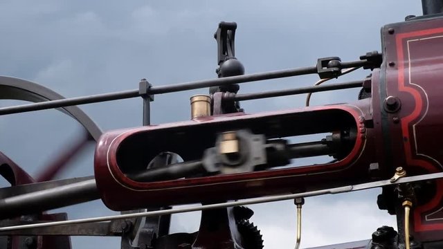 Reciprocating arm on vintage steam traction engine.
