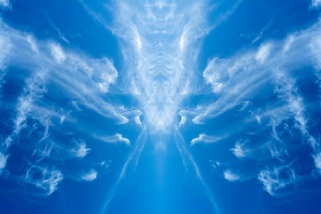 Blue sky background with white clouds.