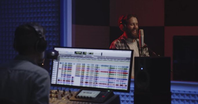 Actor doing voice over in sound studio