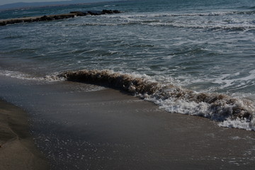 waves breaking on the shore