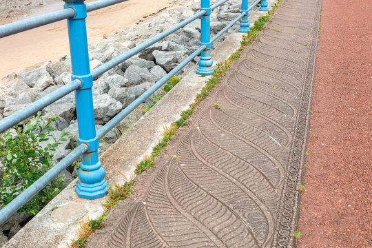 Detail of bird feathers decoration along the seaside promenade in Morecambe, Lancashire.