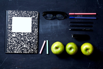 Back to school or student and education concept. Top view. Flat lay. Notebooks, apples and school accessories