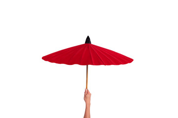 ็Hand holding Red umbrella isolated on white background.
