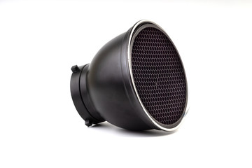 Reflector with honeycomb grid accessory for studio strobes and flashes on white background....