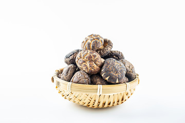 Dried fungus ingredients shiitake mushrooms on white background