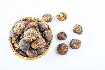 Dried fungus ingredients shiitake mushrooms on white background