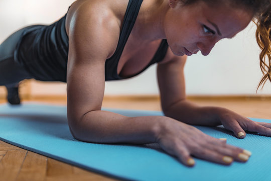 Woman Doing High-Intensity Interval Training Exercises