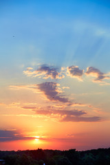 Beautiful sunset with the rays of the setting sun