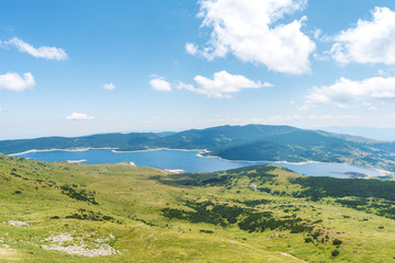 Panoramic photo of summer mountain valley. Fabulous warm day in the mountains, amazing nature. Travel and hike