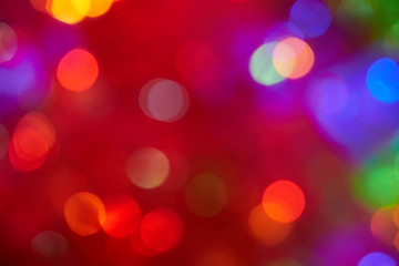 Colored mugs randomly placed on a blurred background