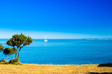 Beautiful seascape on Adriatic sea in Croatia, Dugi otok island, sailing boat on sea in bay on Veli Rat