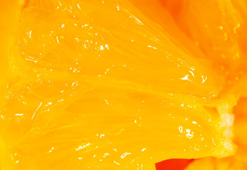 Juicy orange pulp as abstract background