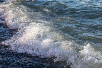 Waves on the seashore as an abstract background