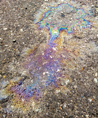 Gasoline stains on the wet as a background