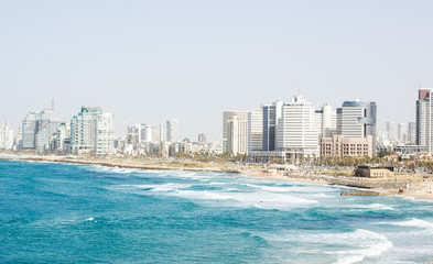 beautiful and expensive summer season vacation destination place landscape and landmark photography of Israeli capital Tel Aviv with skyscrapers modern building along Mediterranean sea beach shoreline