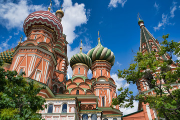 Fototapeta na wymiar Multicolored domes of St. Basil's Cathedral on Red square in Moscow, Russia