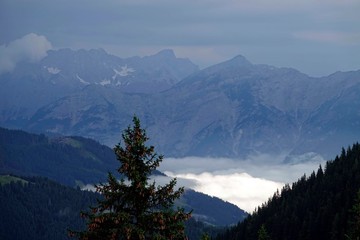 a foggy and rainy day in summer on the mountains