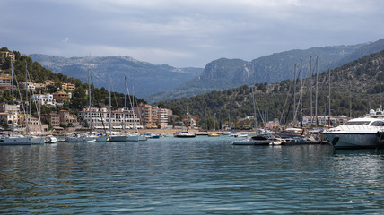 Fototapeta na wymiar seafront at Port de Soller with yachts and boats