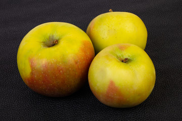 Ripe apples over background