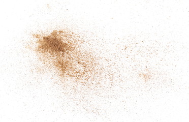 Fototapeta na wymiar Cinnamon powder isolated on white background, top view