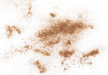 Fototapeta na wymiar Cinnamon powder isolated on white background, top view