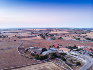 Aerial view of a rural field in Sicily at early sunrise