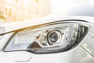 Modern led headlight of white automobile