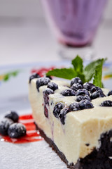 cheesecake with fresh blueberries and mint