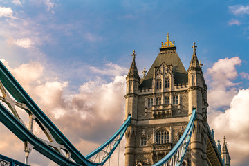 Fototapeta na wymiar Tower bridge in London at sunset with dramatic sky and cloudscape
