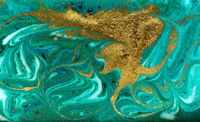 Fototapeta na wymiar Green and gold marbling pattern. Golden powder marble liquid texture.