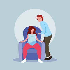 pregnant wife sitting in sofa with husband