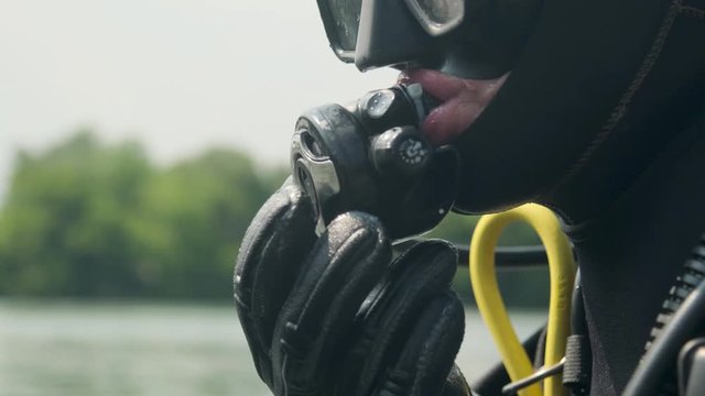 scuba diver preparing to dive. Portrait of a scuba diver with all of the equipment