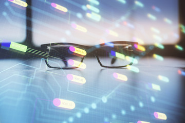 Data tech hologram with glasses on the table background. Concept of technology. Double exposure.