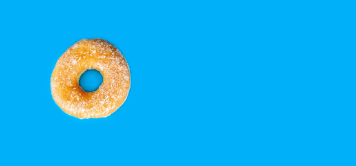 Fototapeta na wymiar Donuts on a bright blue background